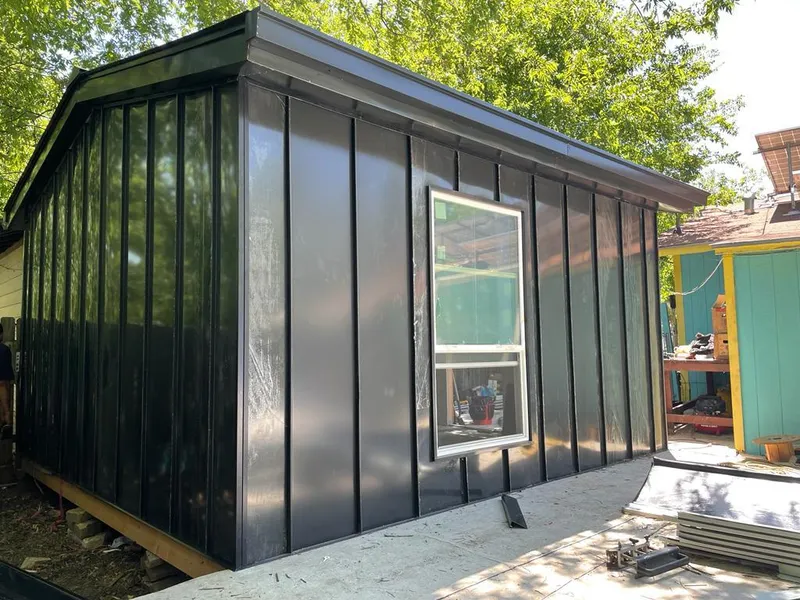 Black standing seam metal wall panels for Metal Roof Installation in Armada