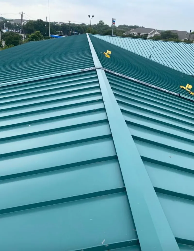 Green commercial metal roof ridge and valley for Metal Roof Repair in Armada